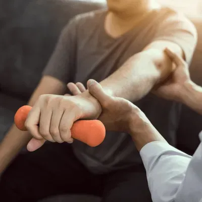 Therapist supports a person