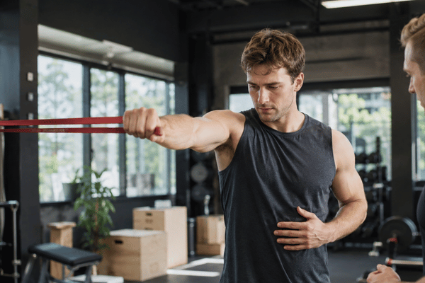 Shoulder Impingement Recovery Time for Lifters and Overhead Athletes: What Speeds It Up and What Sets You Back